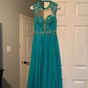 Teal chiffon prom dress with capped sleeves